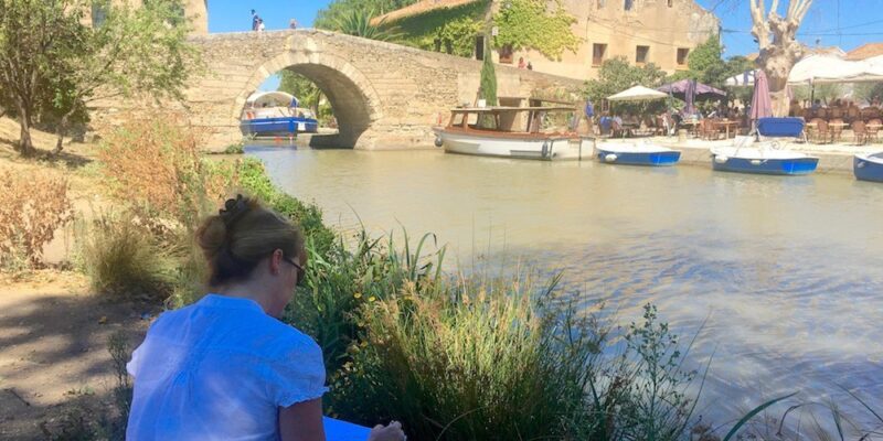 Annette sketching at Le Somail